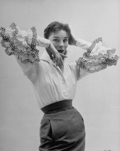 Givenchy's  "Bettina Blouse" found great success in the designer's first ever collection in February 1952. It was named after its model and Givenchy muse Bettina Graziani. Image via Givenchy.com